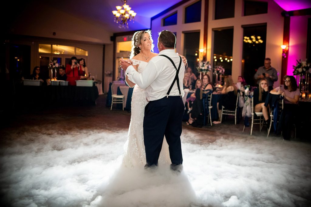 Bride and groom dancing with dry ice on the dancefloor at the links of kent in Chathm