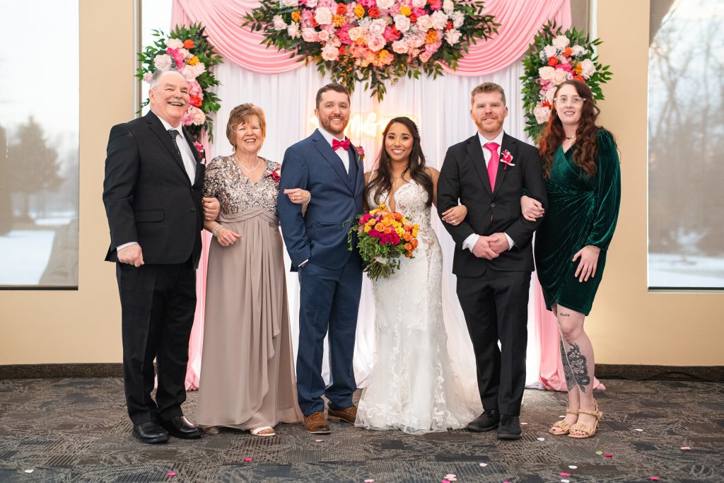 Group shot (wedding day family group photo from the Links of Kent in Chatham)