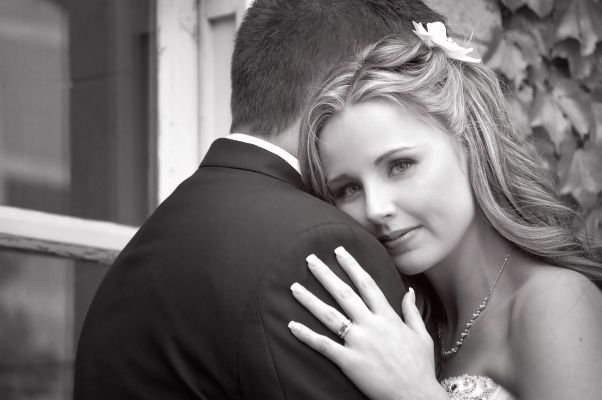 bride and groom embracing