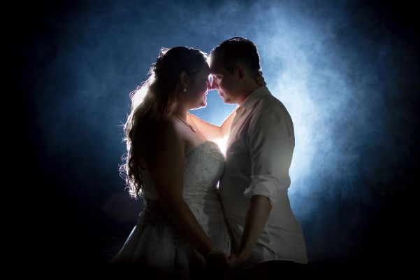 Bride and groom at night backlit Chatham