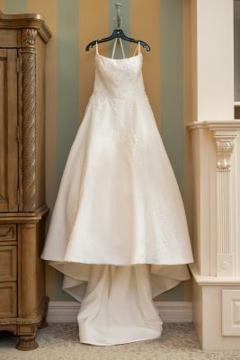 Wedding dress hanging up