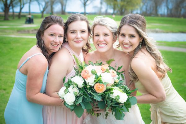 bridal party with flowers photographed in Chatham