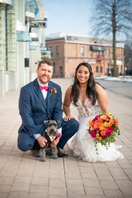Happy couple with their dog behind the retrosuites hotel (just about to get married!)
