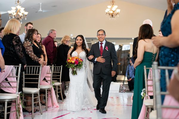 Bride walking down the isle on wedding day