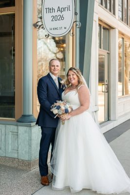 bride and groom standing on king street, chatham